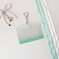 Detail of glitter acrylic card holder with heart clasp and mint green gradient finish - Horizontal - Green