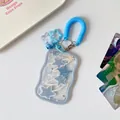 Detail van blauwe ster kaarthouder met spiraalkoord en een klein belletje - Blauw