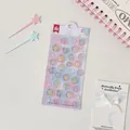 Dettaglio di adesivi 3D in resina con trifoglio per decorazione di agende fai-da-te - Fuochi d'artificio