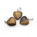 Tiger eye heart stone pendants with silver metal clasps on a white background - Large / Tiger's Eye