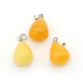 Pendentifs gouttes en pierre polie aux tons jaunes avec fermoirs en métal argenté - Topaze
