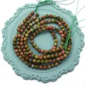 Perle tonde sfaccettate in pietra naturale unakite per creazione gioielli - Unakite