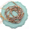 Fils de perles en pierre naturelle facettée orange doux pour création de bijoux - 2.0mm / Pierre de Lune Multicolore