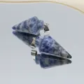 Arrowhead sodalite stone pendant with blue mottled texture and silver metal clasp - Blue Spot Stone