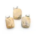Colgantes rectangulares de piedra natural con texturas jaspeadas en beige y amarillo - Ágata Loca