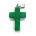 Detail shot of a cross-shaped green gemstone pendant with a silver metal bail hook - 18X29mm / Green Jade