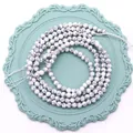 Perle sfaccettate trama marmo bianco per creazione gioielli su vassoio decorativo - Bracciale Howlite Bianca