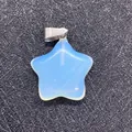 Star shaped translucent opalite stone pendant with silver clasp on black textured background - Opal