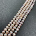 Strands of pink-purple freshwater pearls in a near-round shape with high luster finish - Medium Small / Purple