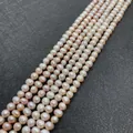 Stränge aus rosa und champagnerfarbenen Süßwasserperlen für die DIY-Schmuckherstellung - 4-5mm / Lila