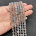 Gefacetteerde grijsblauwe agaat kralen voor sieraden maken in de hand getoond voor de maat - Grijze Agaat