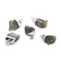 Five pieces of grey natural stone pendants with silver metal bails on white background - Gray Stone Silver