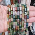 Handheld view of multi-colored 6x10mm natural stone cylinder beads for DIY jewelry - 6x10mm / Mixed Natural Stone (No. 5)