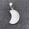 White crescent moon pendant in translucent finish with silver-tone metal clasp - White Cat's Eye Stone