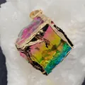 Rainbow gradient crystal cube pendant with textured gold-tone metal frame and loop - Rainbow