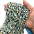 Faceted Amazonite stone beads held in hand for DIY jewelry making - Amazonite No.1