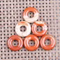 Polished red jasper donut pendants with natural patterns in a six-piece set - Red Jasper