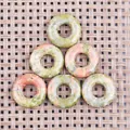 Polished natural Unakite stone donut pendants with green and pink mottled texture - Unakite