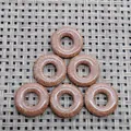Brown sandstone donut pendants with interlocking metal logo, 6-piece jewelry set - Gold Sandstone