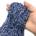 Faceted natural blue sodalite small round beads for DIY jewelry making and crafts - Blue Spot Stone