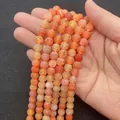 Strands of round orange dragon vein agate beads with white cracked texture - 6mm / Orange