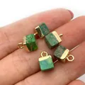 Five cube-shaped green emperor stone pendants with gold clasps held in a hand - 5x10mm / Emerald Green (No. 4)