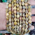 Strands of teardrop-shaped natural agate beads with yellow and grey striped patterns - Sardonyx (No. 11)