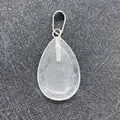 Teardrop shaped transparent crystal stone pendant with silver metallic bail accessory - Transparent Crystal