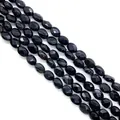 Polished black faceted oval gemstone beads arranged in parallel for DIY jewelry making - US 6