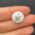 Flat round white shell pendant with gold letter H charm for DIY jewelry making - Letter H