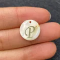 Natural shell round pendant with golden letter P detail for DIY necklace jewelry - Letter P