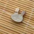Iridescent white mother of pearl rabbit bead for DIY jewelry making and handmade crafts - Rabbit Head Shape / 10x12mm / Black Shell (Horizontal Hole)