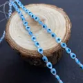 Light blue teardrop evil eye beads on white string for DIY jewelry making and crafts - Teardrop / 5mm