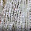 Star-shaped natural mother of pearl shell loose beads with white iridescent luster - Star