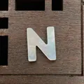 Letter N natural white mother of pearl bead with iridescent finish for DIY jewelry - Letter N