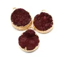 Macro view of three deep red druzy crystal round pendants with gold-plated metal edging - Dark Red (No. 1)