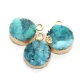 Macro detail of round druzy quartz pendants with gold plated edges for DIY jewelry making - Lake Blue (No.5)
