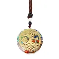 Macro shot of circular resin Orgonite pendant featuring Tree of Life and colorful gemstones - Tree of Life Ethnic Style (3-15)