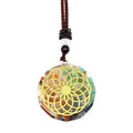 Close-up of Life of Flower resin pendant with colorful natural stones and gold metal inlay - Flower of Life Patch Style (3-9)