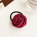 Elegant burgundy satin rose hair tie with elastic band for a stylish ponytail - Red