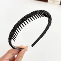 Cerchietto nero glitterato con denti antiscivolo per una tenuta sicura ed elegante - Nero
