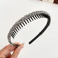 Cerchietto nero scintillante con strass argentati e denti a pettine antiscivolo - Argento