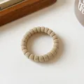 Elastic ribbed khaki hair tie made of soft fabric for minimalist ponytail styling - Beige