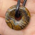 Tiger eye natural stone donut pendant with brown and gold textures on black cord - Tiger Eye (No.9)