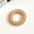 Élastique cheveux spirale beige minimaliste avec finition en résine mate durable - Poche zippée
