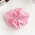 Chouchou élégant en organza rose pâle avec fini nacré et haute élasticité - Rose