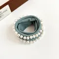Elegant dusty blue high-elastic hair tie with white faux pearl trim on white background - Fog Blue