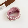 Pink velvet hair tie with double-row white pearls for elegant ponytail styling - Korean Pink