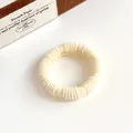 Creamy beige elastic towel hair tie with soft ribbed texture for ponytail - Off White