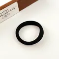 Elastic black seamless hair tie with soft knitted texture for durable ponytail styling - Black